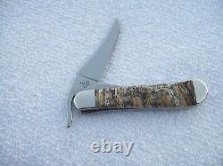 Case xx USA Russlock Elk & Bison Fossil Tooth Custom Handles with COA Never Used
