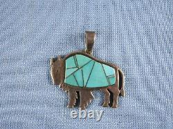 Sterling silver inlaid turquoise bison pendant Calvin Begay Navajo