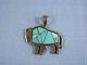 Sterling silver inlaid turquoise bison pendant Calvin Begay Navajo