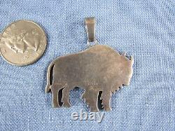 Sterling silver inlaid turquoise bison pendant Calvin Begay Navajo