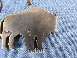 Sterling silver inlaid turquoise bison pendant Calvin Begay Navajo