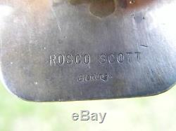 Vintage Deer Silver by R Scott pendant placed on bison leather cuff bracelet