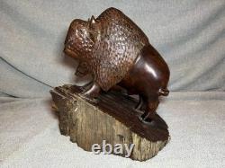 Vintage Hand Carved 11 Inch Tall Dark Wooden Buffalo Statue